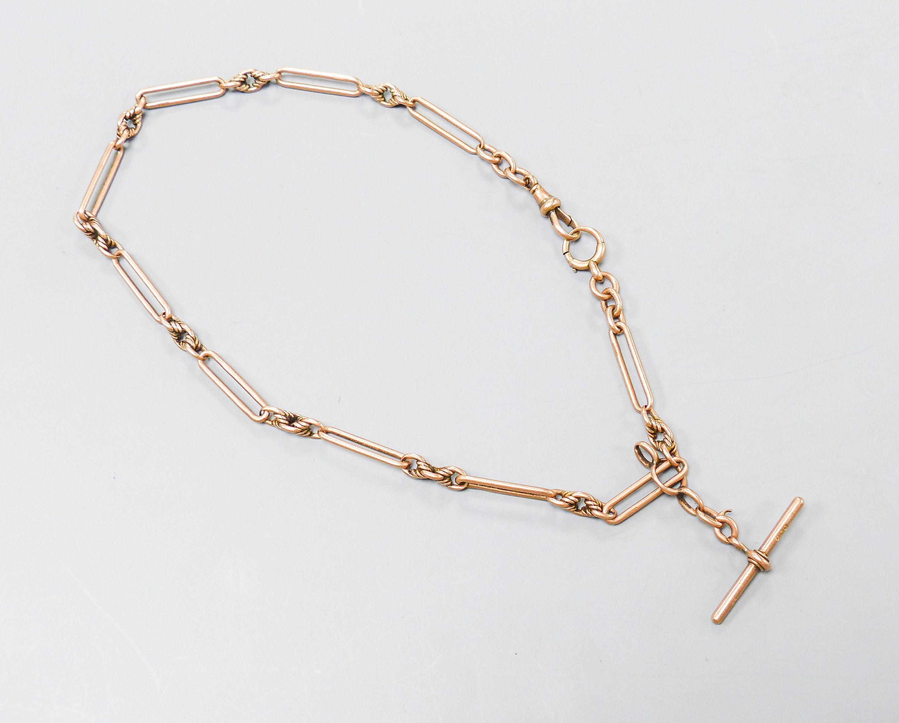 A 9ct rose gold albert, 47cm, 33 grams.